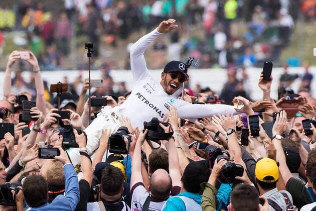 July 16th 2017, Silverstone, Northamptonshire, England; British Formula 1 Grand Prix, Race Day; Mercedes AMG Petronas Motorsport driver Lewis Hamilton crowd surfing xTimxWilliamsx  ActionPlus11902607