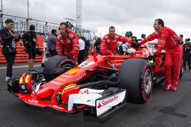 July 16th 2017, Silverstone, Northamptonshire, England; British Formula 1 Grand Prix, Race Day; Scuderia Ferrari driver Sebastian Vettel is pushed onto the starting grid xTimxWilliamsx  ActionPlus11902616