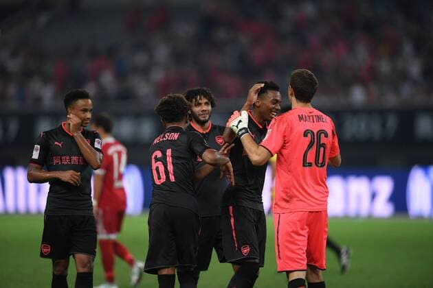 Players of Arsenal celebrate after scoring a goal against Bayern Munich during the Shanghai match of the 2017 International Champions Cup China in Shanghai, China, 19 July 2017. Arsenal competes against Bayern Munich during 2017 International Champions Cup in Shanghai  20170719_10211