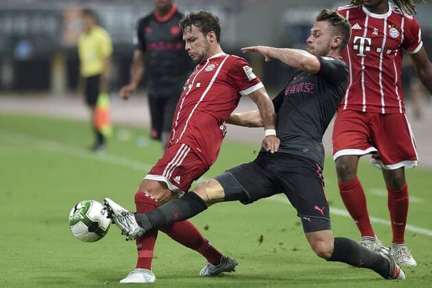 SHANGHAI, CHINA - JULY 19: Juan Bernat 14 of Bayern Muenchen and Aaron Ramsey 8 of Arsenal compete for the ball during 2017 International Champions Cup China between FC Bayern Munich and Arsenal FC at Shanghai Stadium on July 19, 2017 in Shanghai, China.  Copyright: xVCGx CFP111120417717 