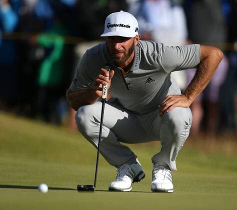 20th July 2017, Royal Birkdale Golf Club, Southport, England; The 146th Open Golf Championship, First round; Dustin Johnson (USA) studies his birdie putt on the 15th green xDavidxBlunsdenx  ActionPlus11904128
