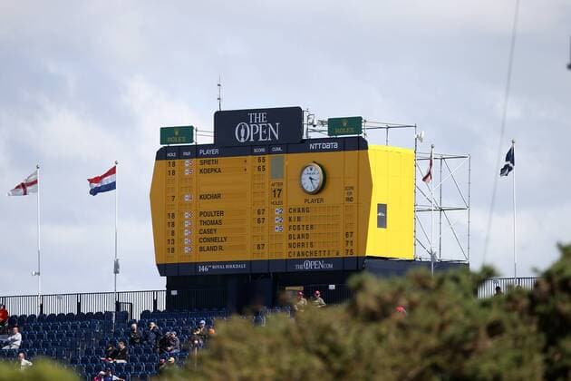 20th July 2017, Royal Birkdale Golf Club, Southport, England; The 146th Open Golf Golf Championship, First round; A view of the main scoreboard above the grandstand on the 18th hole showing Jordan Spieth (USA) and Brooks Koepka of (USA) as joint leaders with opening rounds of 65 xDavidxBlunsdenx  ActionPlus11904194
