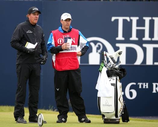 21st July 2017, Royal Birkdale Golf Club, Southport, England; The 146th Open Golf Championship ; Second round ; Phil Mickelson (USA) studies the course planner with his caddie xDavidxBlunsdenx  ActionPlus11904410
