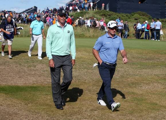 20th July 2017, Royal Birkdale Golf Club, Southport, England; The 146th Open Golf Championship, First round; Ryan Fox (NZ) walks from the 15th tee chatting to Matt Kuchar (USA) xDavidxBlunsdenx  ActionPlus11904419