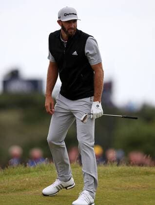 21st July 2017, Royal Birkdale Golf Club, Southport, England; The 146th Open Golf Championship, second round; Dustin Johnson (USA) takes a look at the contours around the ninth green after hitting his approach into the gorse xDavidxBlunsdenx  ActionPlus11904443