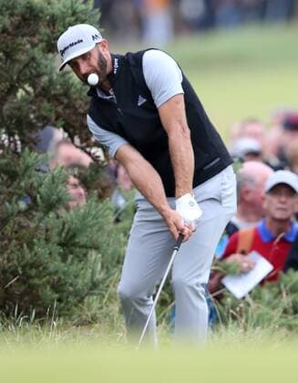 Themen der Woche - SPORT Bilder des Tages - SPORT 21st July 2017, Royal Birkdale Golf Club, Southport, England; The 146th Open Golf Championship, second round; Dustin Johnson (USA) pitches onto the ninth green after hitting his approach into the gorse xDavidxBlunsdenx  ActionPlus11904444