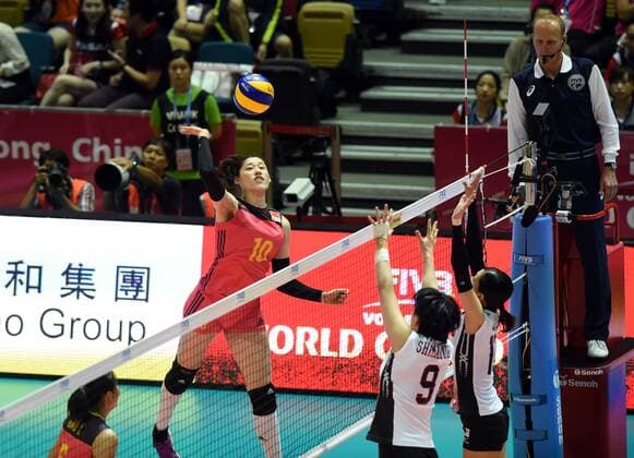 Liu Xiaotong of China spikes against Haruyo Shimamura of Japan during the Pool G1-Group 1 match of the FIVB Volleyball World Grand Prix Hong Kong 2017 in Hong Kong, China, 21 July 2017. China defeated Japan 3-1 (25-19, 25-20, 33-35, 25-21). China defeats Japan during FIVB Volleyball World Grand Prix Hong Kong 2017  pbu656153_24