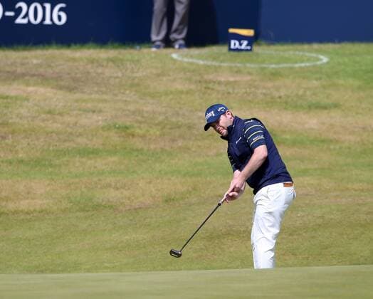 22nd July 2017, Royal Birkdale Golf Club, Southport, England; The 146th Open Golf Championship, third round ; Branden Grace (RSA) plays a long putt from the back of the 18th green needing a par for the record low score of 62 in an Open Championship xDavidxBlunsdenx  ActionPlus11904859