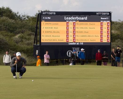 22nd July 2017, Royal Birkdale Golf Club, Southport, England; The 146th Open Golf Championship, third round ; Championship leader Jordan Spieth (USA) looks at the line of his birdie putt on the 16th green in front of the leaderboard xDavidxBlunsdenx  ActionPlus11905219