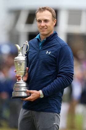 23rd July 2017, Royal Birkdale Golf Club, Southport, England; The 146th Open Golf Championship, fourth round ; Jordan Spieth (USA) smiles as he holds the claret jug trophy as Champion Golfer of the Year xDavidxBlunsdenx  ActionPlus11905757