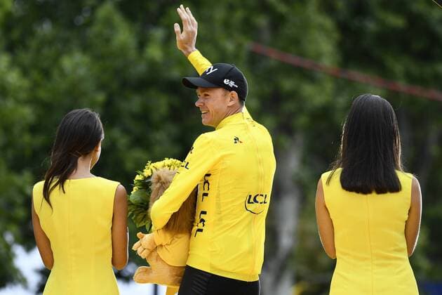 British Chris Froome of Team Sky celebrates on the podium in the yellow jersey of leader in the overall ranking after the 104th edition of the Tour de France cycling race, in Paris, France, Sunday 23 July 2017. This year s Tour de France takes place from July first to July 23rd. YORICKxJANSENS  x05137589x