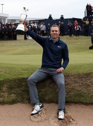 American Jordan Spieth holds the Claret jug after victory at the 146th Open Championship at Royal Birkdale Golf Club, Southport on July 23, 2017. Spieth won in a combined score of 268, twelve under par.  LON2017072399 HUGOxPHILPOTT