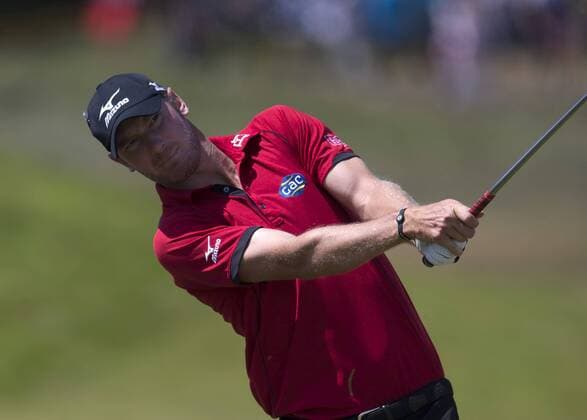 23rd July 2017, Royal Birkdale Golf Club, Southport, England; The 146th Open Golf Championship, fourth round ; Chris Wood (ENG) hits his second shot from the rough on the 8th hole xDavidxBlunsdenx  ActionPlus11905772