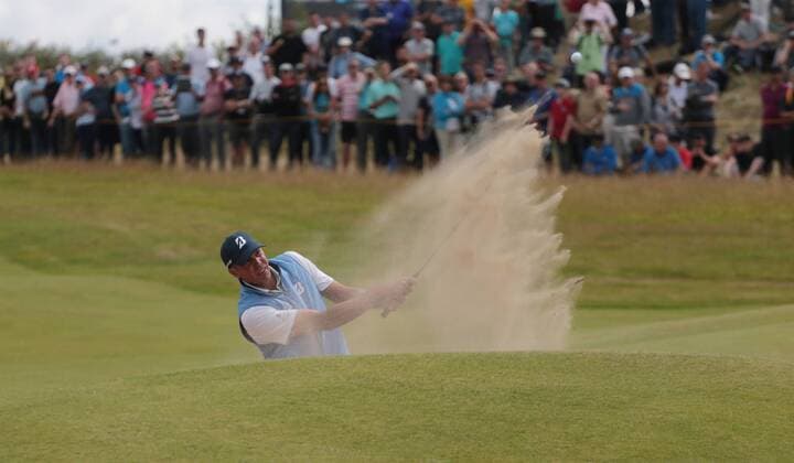 American Matt Kuchar hits out of the bunker on the 3rd hole on the final day of the 146th Open Championship at Royal Birkdale Golf Club, Southport on July 23, 2017. Spieth beat Kuchar with a combined score of 268, twelve under par.  LON2017072333 HUGOxPHILPOTT