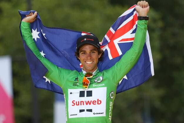 Michael Matthews of Australia celebrates on the presentation podium after winning the green jersey (overall points leader) at the Tour de France in Paris on July 23, 2017.  PAR20170723017 DAVIDxSILPA