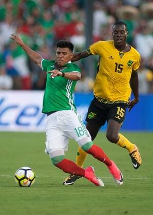 July 23, 2017 - Pasadena, California, U.S - Jesus Gallardo 18 of Mexico and Je-Vaughn Watson 15 of Jamaica battle for the ball during their Gold Cup Semifinal game at the Rose Bowl in Pasadena, California on Sunday July 23, 2017. Jamaica defeats Mexico, 1-0. Jamaica defeats Mexico, 1-0 - ZUMAp124 20170723_zaa_p124_031 Copyright: xJavierxRojasx