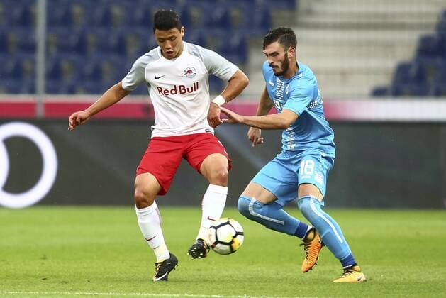 SOCCER - UEFA CL quali, RBS vs Rijeka SALZBURG,AUSTRIA,26.JUL.17 - SOCCER - UEFA Champions League qualification, Red Bull Salzburg vs HNK Rijeka. Image shows Hee Chan Hwang (RBS) and Josip Elez (Rijeka). GEPAxpictures xFelixxRoittner