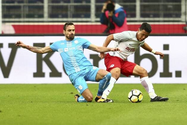 SOCCER - UEFA CL quali, RBS vs Rijeka SALZBURG,AUSTRIA,26.JUL.17 - SOCCER - UEFA Champions League qualification, Red Bull Salzburg vs HNK Rijeka. Image shows Josip Elez (Rijeka) and Hee Chan Hwang (RBS). GEPAxpictures xFelixxRoittner