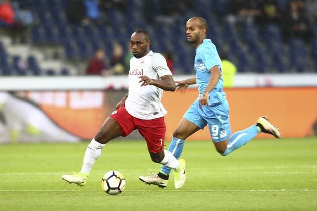 SOCCER - UEFA CL quali, RBS vs Rijeka SALZBURG,AUSTRIA,26.JUL.17 - SOCCER - UEFA Champions League qualification, Red Bull Salzburg vs HNK Rijeka. Image shows Reinhold Yabo (RBS) and Heber dos Santos (Rijeka). GEPAxpictures xFelixxRoittner