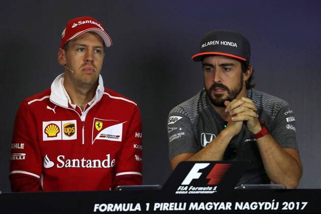 Hungarian Grand Prix, Hungaroring 27 - 30 July 2017 27.07.2017 - Sebastian Vettel (GER) Scuderia Ferrari SF70H and Fernando Alonso (ESP) McLaren MCL32 
