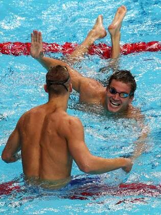 July 27, 2017 - Budapest, Hungary - USA s Caeleb Remel Dressel (L) celebrates with USA s Nathan Adrian after winning the men s 100m freestyle final during the swimming competition at the 2017 FINA World Championships in Budapest, on July 27, 2017. Budapest 2017 FINA World Championship WM Weltmeisterschaft - Day 14  - ZUMAn230 20170727_zaa_n230_225 Copyright: xFotoxOlimpikx
