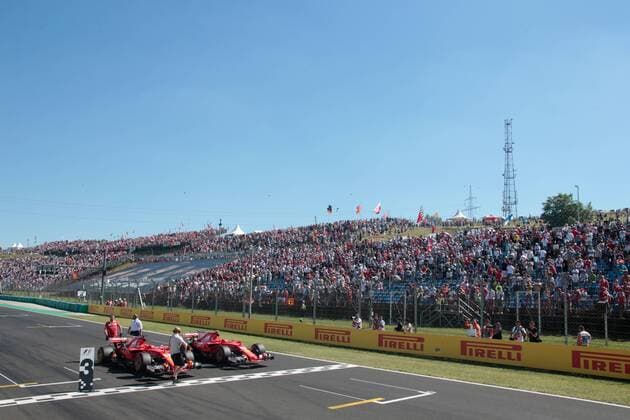 FORMULA 1 - Hungarian GP BUDAPEST,HUNGARY,29.JUL.17 - MOTORSPORTS, FORMULA 1 - Grand Prix of Hungary, Hungaroring, qualifying. Image shows Sebastian Vettel (GER Ferrari), Kimi Raikkoenen (FIN Ferrari) and fans. GEPAxpictures xFritzxMueller