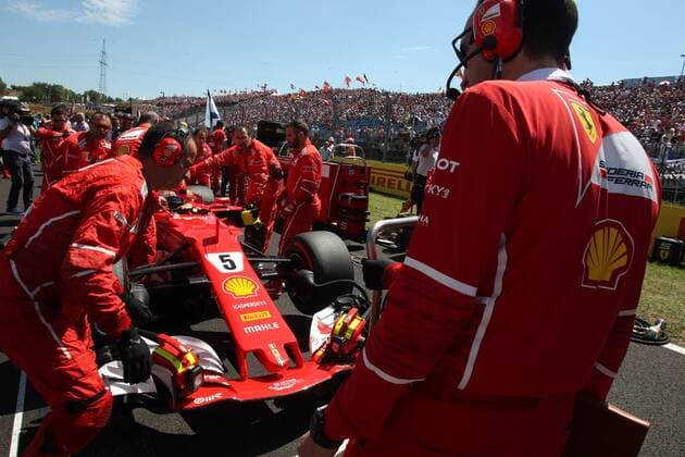 Hungarian Grand Prix, Hungaroring 27 - 30 July 2017 30.07.2017 - Sebastian Vettel (GER) Scuderia Ferrari SF70H and Riccardo Adami (ITA) Ferrari Race Engineer 
