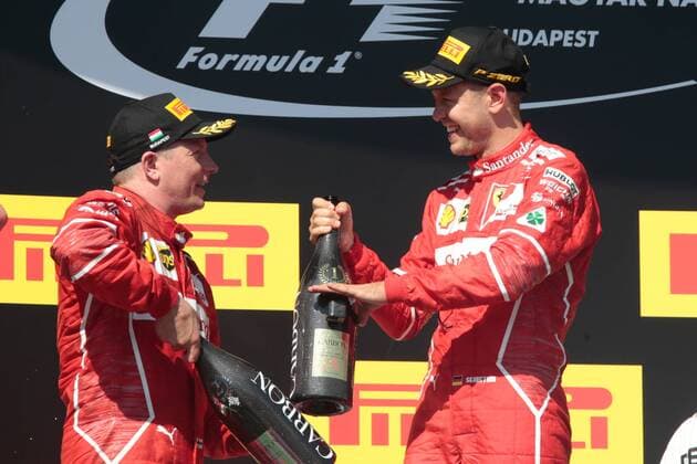 FORMULA 1 - Hungarian GP BUDAPEST,HUNGARY,30.JUL.17 - MOTORSPORTS, FORMULA 1 - Grand Prix of Hungary, Hungaroring. Image shows Kimi Raikkoenen (FIN Ferrari) and Sebastian Vettel (GER Ferrari). Keywords: award ceremony, champagne shower. GEPAxpictures xFritzxMueller