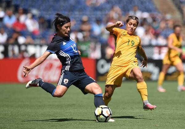 SAN DIEGO, CA - JULY 30: Hikaru Naomoto (12) of Japan passes the ball against Karina Gorry (19) of Australia during the Tournament of Nations soccer match between Japan and Australia on July 30, 2017 at Qualcomm Stadium in San Diego, CA. (Photo by Chris Williams Icon Sportswire) SOCCER: JUL 30 Tournament of Nations - Japan v Australia Icon00717073016026 EDITORIAL USE ONLY