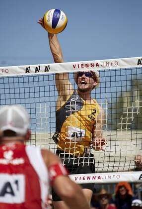 VIENNA, AUSTRIA - JULY 30: Lars Flueggen of Germany spikes the ball during Day 3 of the FIVB Beach volleyball Beachvolleyball World Championships 2017 on July 30, 2017 in Vienna, Austria. (Photo by Mike Ranz Hoch Zwei) Vienna Austria xHOCHxZWEIx