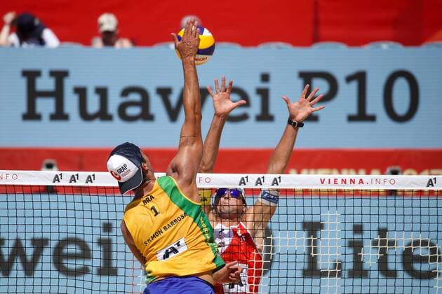 Beach volleyball Beachvolleyball - FIVB World Championships 2017 VIENNA,AUSTRIA,31.JUL.17 - BEACH VOLLEYBALL - FIVB World Championships, men. Image shows Christoph Dressler (AUT) and Saymon Barbosa Santos (BRA). GEPAxpictures xMaticxKlansek