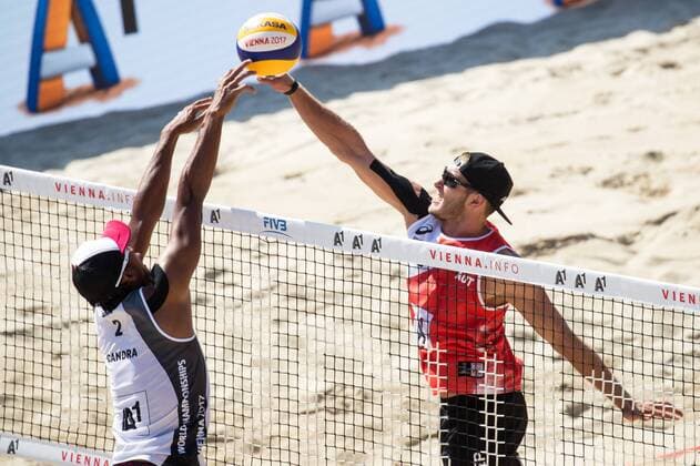 Beach volleyball Beachvolleyball - FIVB World Championships 2017 VIENNA,AUSTRIA,01.AUG.17 - BEACH VOLLEYBALL - FIVB World Championships, men. Image shows Ade Rachawan (INA) and Martin Ermacora (AUT). GEPAxpictures xMaticxKlansek