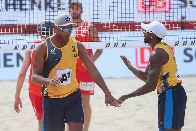 Beach volleyball Beachvolleyball - FIVB World Championships 2017 VIENNA,AUSTRIA,02.AUG.17 - BEACH VOLLEYBALL - FIVB World Championships. Image shows Leo Williams and Jamaine Naidoo (RSA). GEPAxpictures xChristianxWalgram