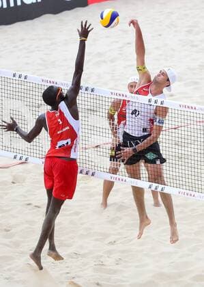 Beach volleyball Beachvolleyball - FIVB World Championships 2017 VIENNA,AUSTRIA,02.AUG.17 - BEACH VOLLEYBALL - FIVB World Championships. Image shows Daneil Williams (TTO) and Christoph Dressler (AUT). GEPAxpictures xChristianxWalgram