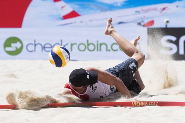 VIENNA, AUSTRIA - AUGUST 01: Sam Schachter of Canada in action during Day 5 of the FIVB Beach volleyball Beachvolleyball World Championships 2017 on August 1, 2017 in Vienna, Austria. (Photo by Malte Christians Hoch Zwei) Vienna Austria xHOCHxZWEIx
