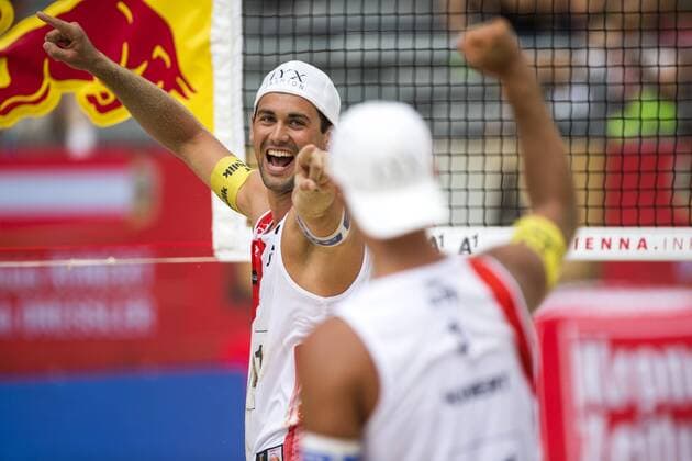 VIENNA, AUSTRIA - AUGUST 02: Christoph Dressler and Thomas Kunert of Austria celebrate during Day 6 of the FIVB Beach volleyball Beachvolleyball World Championships 2017 on August 2, 2017 in Vienna, Austria. (Photo by Malte Christians Hoch Zwei) Vienna Austria xHOCHxZWEIx