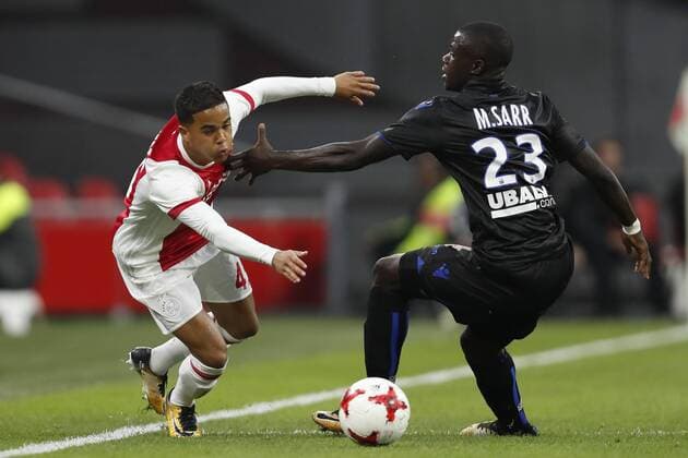 (L-R) Justin Kluivert of Ajax, Malang Sarr of OCG Nice during the UEFA Champions League third round qualifying first leg match between Ajax Amsterdam and OGC Nice at the Amsterdam Arena on August 02, 2017 in Amsterdam, The Netherlands Ajax v OGC Nice UEFA Champions League 2017 2018 xVIxVIxImagesx xMauricexvanxSteenxIVx 8373958