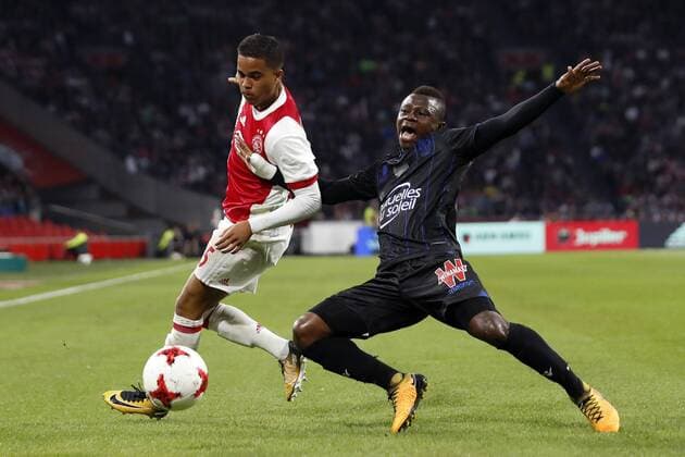 (L-R) Justin Kluivert of Ajax, Jean Michel Seri of OCG Nice during the UEFA Champions League third round qualifying first leg match between Ajax Amsterdam and OGC Nice at the Amsterdam Arena on August 02, 2017 in Amsterdam, The Netherlands Ajax v OGC Nice UEFA Champions League 2017 2018 xVIxVIxImagesx xMauricexvanxSteenxIVx 8374138