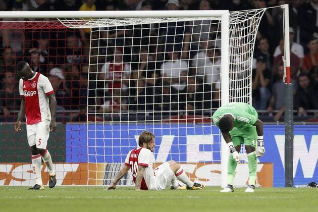 (L-R) Davinson Sanchez of Ajax, Lasse Schone of Ajax, goalkeeper Andre Onana of Ajax during the UEFA Champions League third round qualifying first leg match between Ajax Amsterdam and OGC Nice at the Amsterdam Arena on August 02, 2017 in Amsterdam, The Netherlands Ajax v OGC Nice UEFA Champions League 2017 2018 xVIxVIxImagesx xMauricexvanxSteenxIVx 8374471
