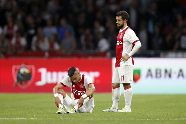(L-R) Hakim Ziyech of Ajax, Amin Younes of Ajax during the UEFA Champions League third round qualifying first leg match between Ajax Amsterdam and OGC Nice at the Amsterdam Arena on August 02, 2017 in Amsterdam, The Netherlands Ajax v OGC Nice UEFA Champions League 2017 2018 xVIxVIxImagesx xMauricexvanxSteenxIVx 8375388