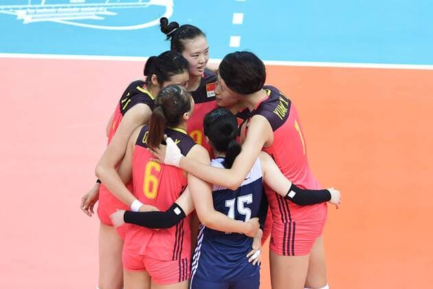 Chinese players celebrate after scoring against Brazil during their match of the FIVB Volleyball World Grand Prix Finals 2017 in Nanjing city, east China s Jiangsu province, 2 August 2017. China defeated Brazil 3-0 (25:22, 25:17, 29:27). China slashes Brazil 3-0 at FIVB Volleyball World Grand Prix Finals 2017  20170802_30508