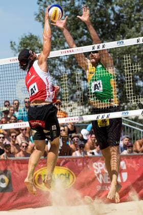 Beach volleyball Beachvolleyball - FIVB World Championships 2017 VIENNA,AUSTRIA,02.AUG.17 - BEACH VOLLEYBALL - FIVB World Championships, men. Image shows Rihard Finsters (LAT) and Alison Conte Cerutti (BRA). GEPAxpictures xMaticxKlansek