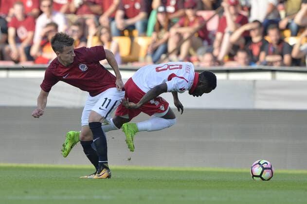 From left soccer players Lukas Marecek of Sparta and Guelor Kanga of Crvena Zvezda Belgrade in action during the Football Champions League third qualifying round s return match: Sparta Praha vs Crvena Zvezda Belgrade in Prague, Czech Republic, April 3, 2018. (CTKxPhoto KaterinaxSulova) CTKPhotoP201708030844701  _SUK8993