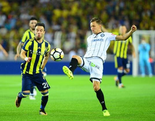 Mathieu Valbuena (L) of Fenerbahce and Stefan Hierlander of Sturm Graz during the UEFA Europa League second leg match between Fenerbahce and Sturm Graz at Ulker Stadium in Istanbul , Turkey on 03 August 2017. 