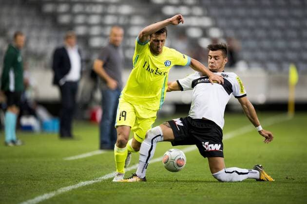 Gent s Brecht Dejaegere and Altach s Kristijan Dobras fight for the ball during a soccer game between Austrian team SC Rheindorf Altach and Belgian club KAA Gent, the return leg of the third qualifying round for the UEFA Europa League competition, Thursday 03 August 2017 in Altach, Austria. The first leg resulted in a 1-1 draw. JASPERxJACOBS  x05143187x