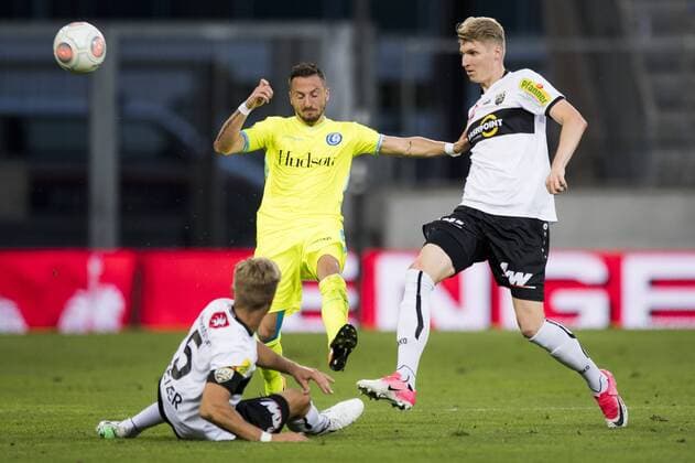 Altach s Philipp Netzer, Gent s Danijel Milicevic and Altach s Simon Piesinger fight for the ball during a soccer game between Austrian team SC Rheindorf Altach and Belgian club KAA Gent, the return leg of the third qualifying round for the UEFA Europa League competition, Thursday 03 August 2017 in Altach, Austria. The first leg resulted in a 1-1 draw. JASPERxJACOBS  x05143191x