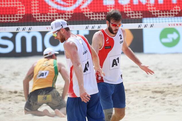 Beach volleyball Beachvolleyball - FIVB World Championships 2017 VIENNA,AUSTRIA,04.AUG.17 - BEACH VOLLEYBALL - FIVB World Championships. Image shows the rejoicing of Chaim Schalk and Ben Saxton (CAN). GEPAxpictures xChristianxWalgram