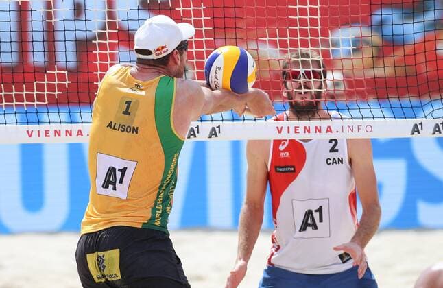 Beach volleyball Beachvolleyball - FIVB World Championships 2017 VIENNA,AUSTRIA,04.AUG.17 - BEACH VOLLEYBALL - FIVB World Championships. Image shows Alison Cerutti (BRA) and Ben Saxton (CAN). GEPAxpictures xChristianxWalgram