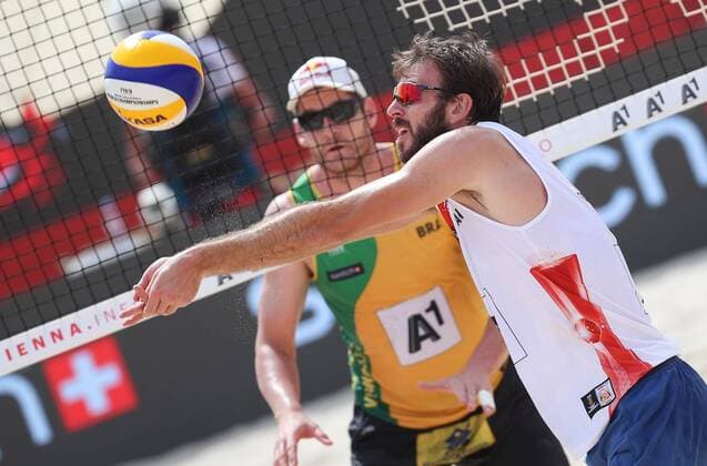 Beach volleyball Beachvolleyball - FIVB World Championships 2017 VIENNA,AUSTRIA,04.AUG.17 - BEACH VOLLEYBALL - FIVB World Championships. Image shows Ben Saxton (CAN) and Alison Cerutti (BRA). GEPAxpictures xChristianxWalgram