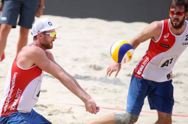 Beach volleyball Beachvolleyball - FIVB World Championships 2017 VIENNA,AUSTRIA,04.AUG.17 - BEACH VOLLEYBALL - FIVB World Championships. Image shows Chaim Schalk and Ben Saxton (CAN). GEPAxpictures xChristianxWalgram